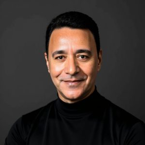 SUDHIR TIKU